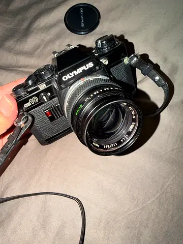 Olympus OM-10 35mm SLR with 50mm f/1.8 Zuiko Lens - Used