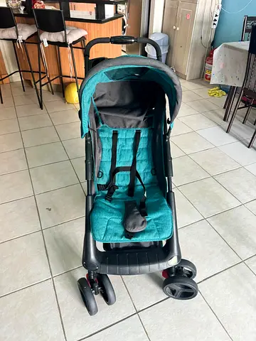 Lightweight teal single stroller in good used condition