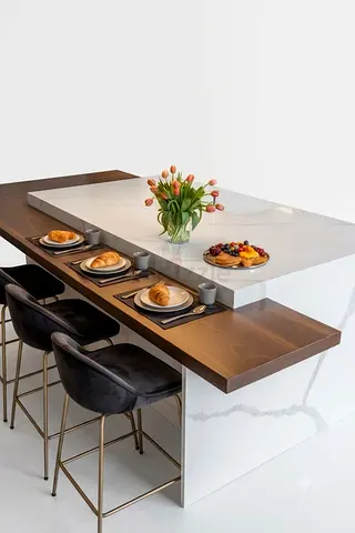 Modern marble kitchen island with wooden breakfast bar