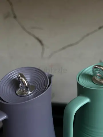 Two electric kettles - pastel grey and mint, lightly used