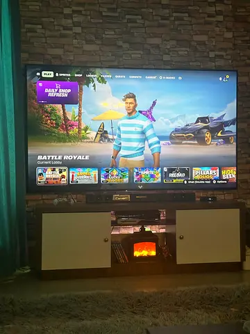 85 iinch LED UHD Smart TV wall-mounted with entertainment cabinet