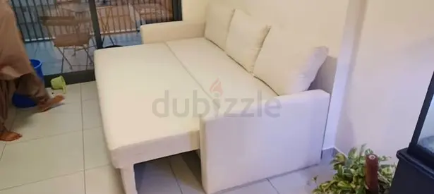 Beige 3-seater sofa bed - good condition, converts to bed