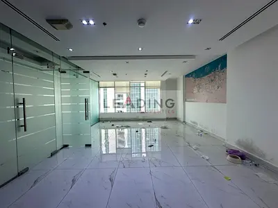 Glass-Partitioned Office | Clover Bay Tower | Downtown View