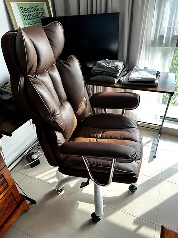 Ultra comfy, faux leather office chair with foot Rest