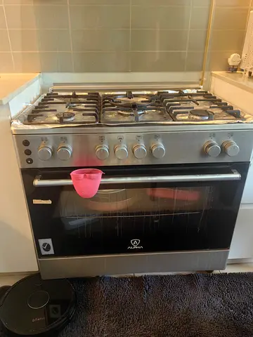 6-burner Gas Cooker with Built-in Oven — Stainless Steel, Good Working Condition