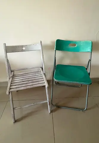 Pair of folding chairs - wooden and green plastic (used)