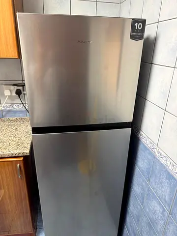 Hisense 2-Door Fridge, Stainless Steel Finish — Good Condition - Moving Out Sales