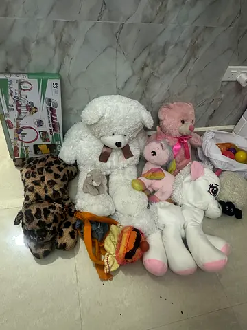 Bundle of assorted stuffed animals and soft toys - good condition
