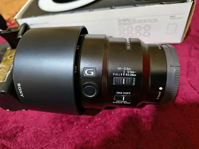 Sony 90 mm macro lens , Godox ML 150ii,  USB battery pack,  tripod mount ring