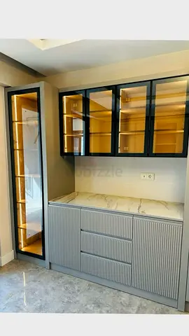 Modern built-in kitchen storage cabinet with glass display