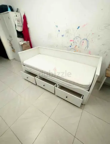 IKEA hamnes day bed with 3 big storage drawers underneath and with 2 IKEA mattresses is available