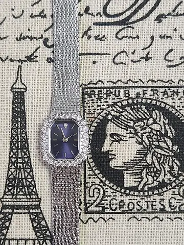 Vintage women's silver bracelet watch with crystal surround