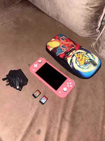 Nintendo Switch Lite + 2 Games and Carry Bag