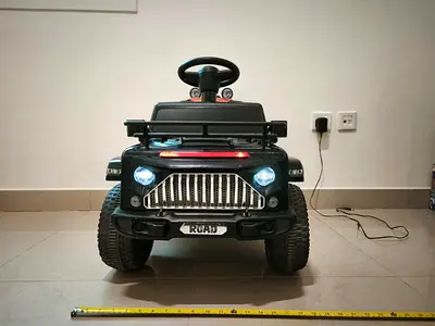 Kids Electric Ride-On Car with Lights and Remote (Good Condition)