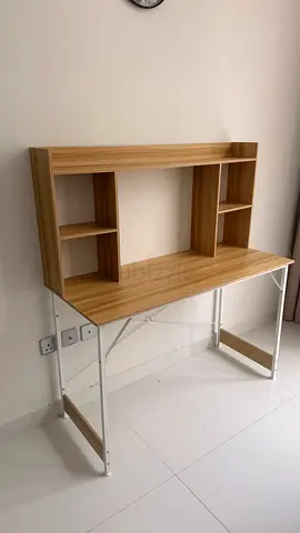 Compact wooden study desk with hutch — good condition