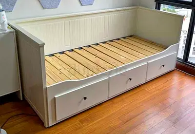 IKEA hamnes day bed with 3 big storage drawers underneath and with 2 IKEA mattresses is available
