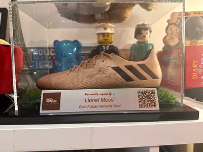 Personally Signed Lionel Messi Gold Adidas Nemeziz Boot (Display Case)