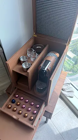 Nespresso Machine custom casing , with espresso cups . Mahogany Table is included