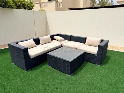 Outdoor rattan modular sofa set with cushions and coffee table. Decent condition just a bit dusty