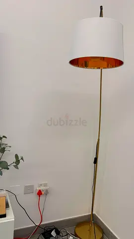 Slim gold floor lamp with white & gold fabric shade