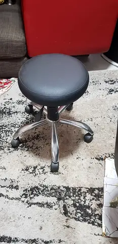 Adjustable Round Swivel Stool with Wheels — Black Vinyl Seat
