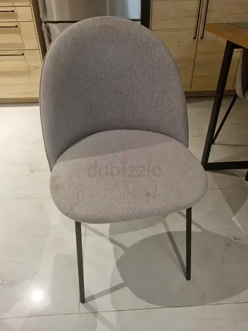 Light grey fabric dining chair with metal legs - set-ready, one stain