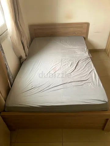 Single wooden bed frame with headboard - light oak finish