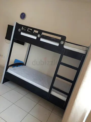MDF very strong Wooden Bunkbed both for adult and child in excellent condition for urgent sale in Aj
