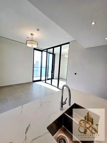 High-Floor Upgraded 1BR Converted to 2BR | RA1N Residence JVC | Balcony & Pool Access | City Views
