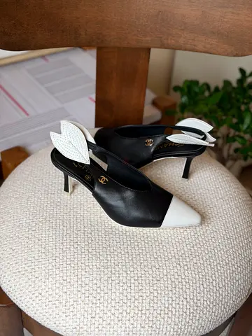Chanel black & white slingback pumps, size unknown — classic two-tone heels