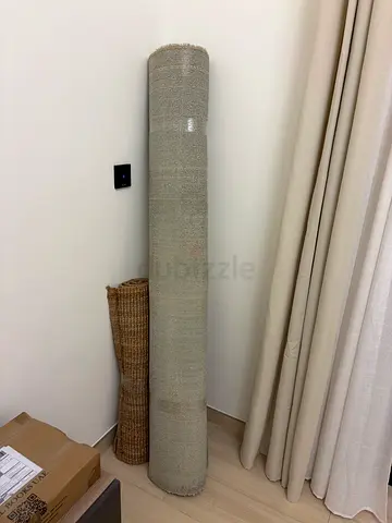 Light grey rolled area rug - good condition