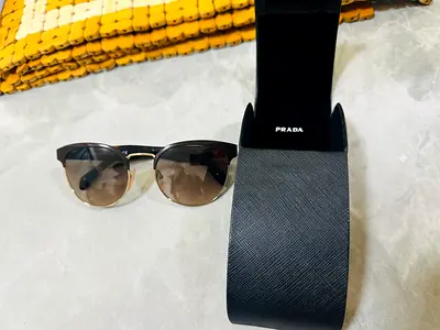 Prada Sunglasses for sale (Women) with original case, cloth and mint condition