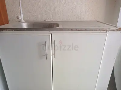Compact white kitchen cabinet with sink (used) complete