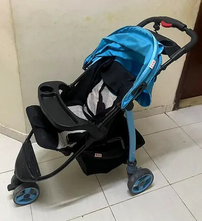 Lightweight blue baby stroller / pram in good used condition