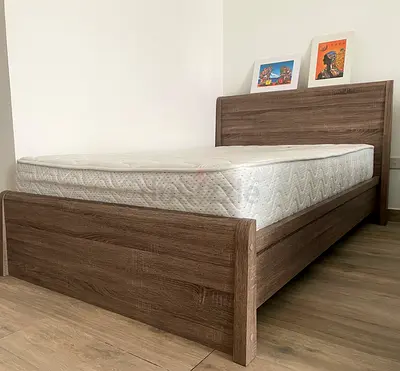 Wooden twin size bed with mattress in Excellent  Condition!