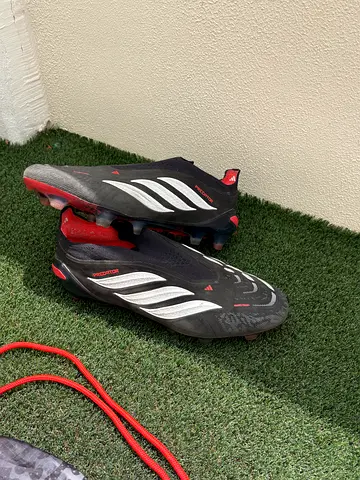 Used Adidas football (soccer) studs cleats - size 42 (black/red)