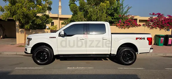 Enormous f-150. Unnecessary. Kind of the point.