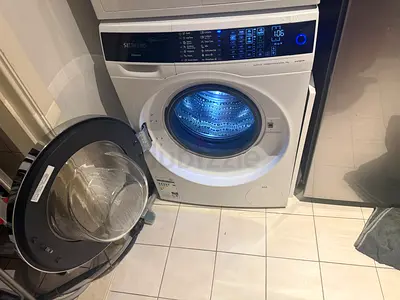 Siemens Front Load Washer 9 kg WM14U640GC - 1400 rpm, an iQdrive quiet motor, and a 5-star energy