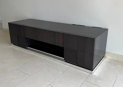 Dark wood low TV cabinet