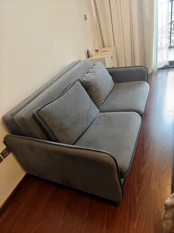 Grey sofa cum bed with storage in good condition