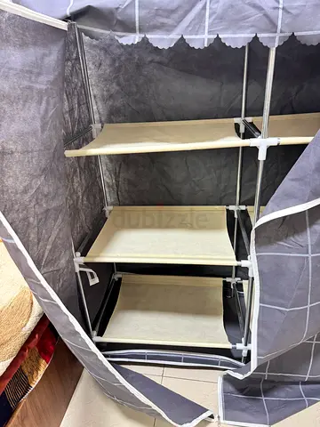 Portable fabric wardrobe with hanging rails and shelves - grey