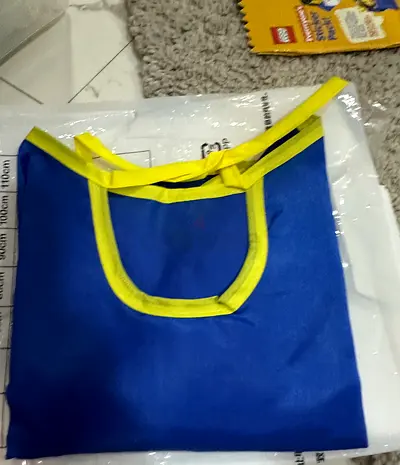 Blue sleeveless apron/vest with yellow trim - Brand new 3/4 sleeve