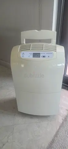 Portable dehumidifier - compact unit in good condition