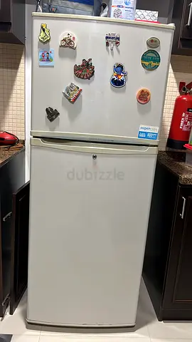 Used two-door refrigerator with freezer - good working condition