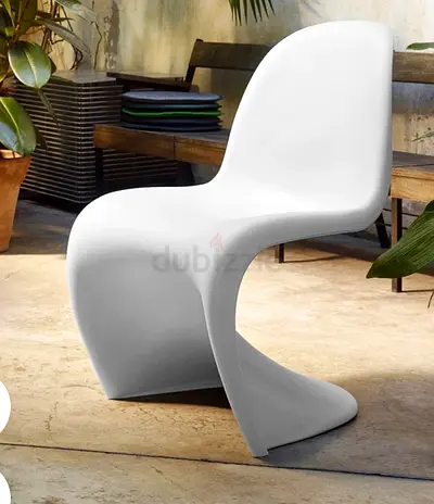 Panton white chairs with the dining table from THE ONE