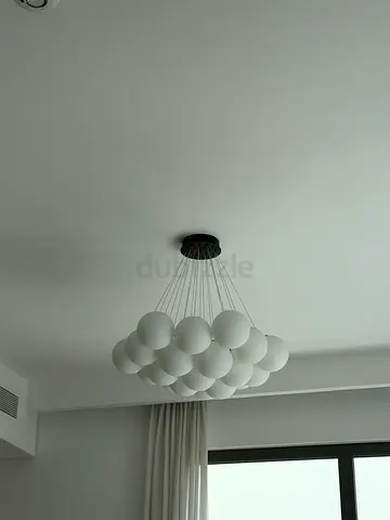 Modern cluster pendant chandelier with matte white glass globes