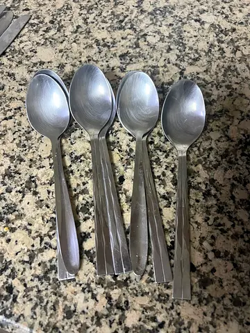 Set of 4 stainless steel table spoons - gently used