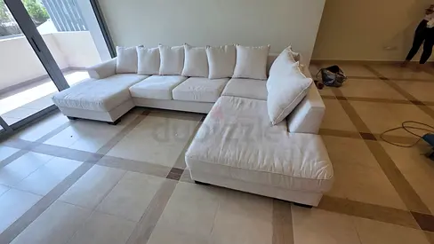 The One brand Kingston u shape sofa beige