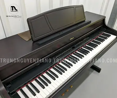 Roland HP7DMH Piano. Japan made. In perfect working. Cash on Free delivery with six months warranty.