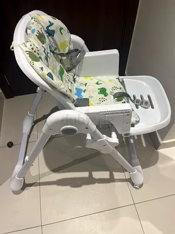 Foldable baby high chair with removable tray and washable cover